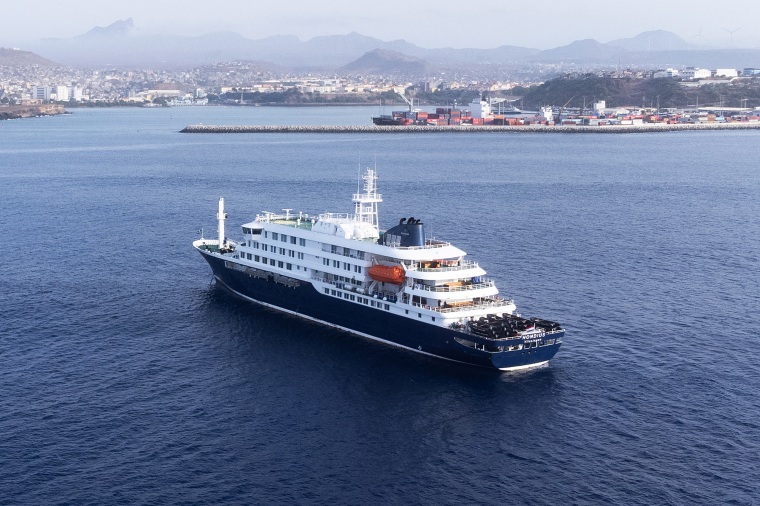 This aerial picture shows a general view of the cruise ship MV Hondius stationary off the port of Praia